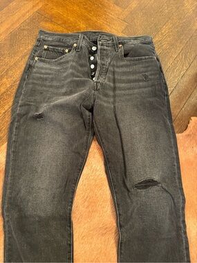 Levi's 501 Black Skinny Jeans with Subtle Distressing